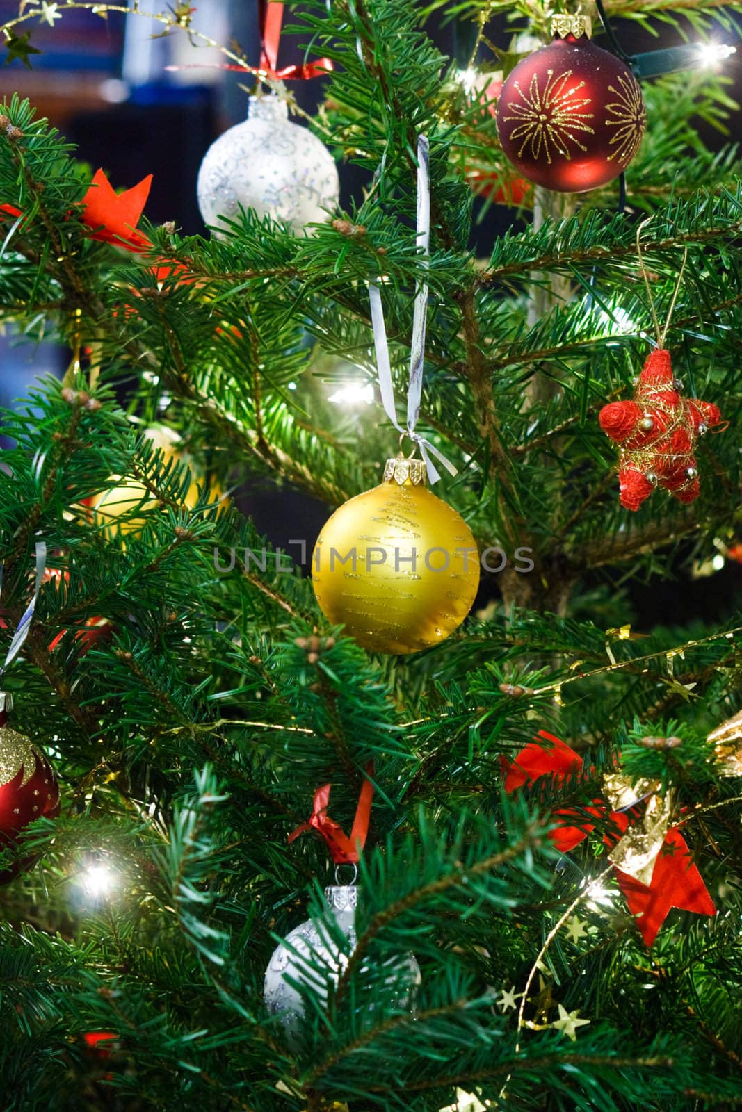 Christmas balls garland and lights on the fir tree