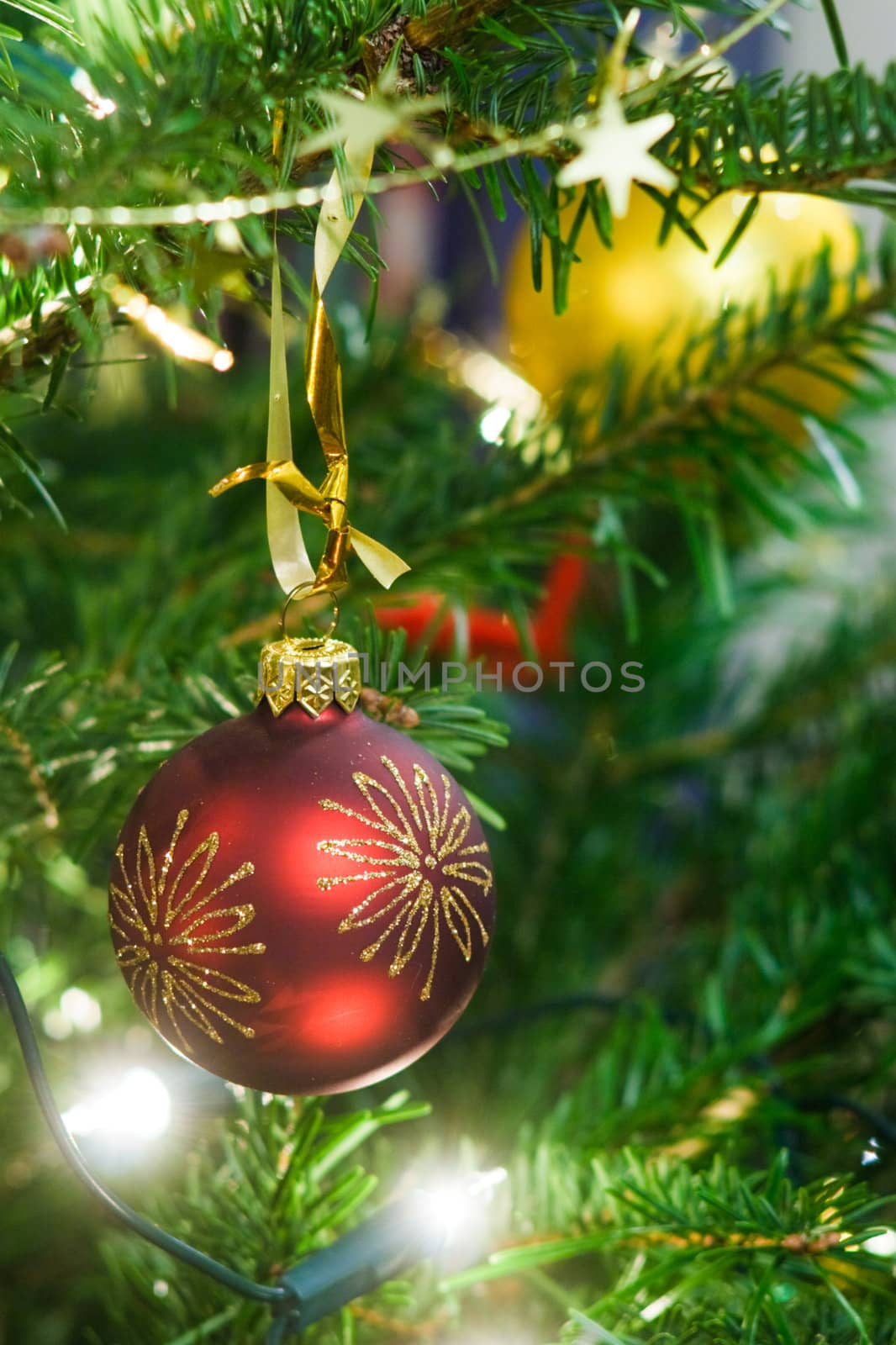 Christmas ball and garland on the fir tree