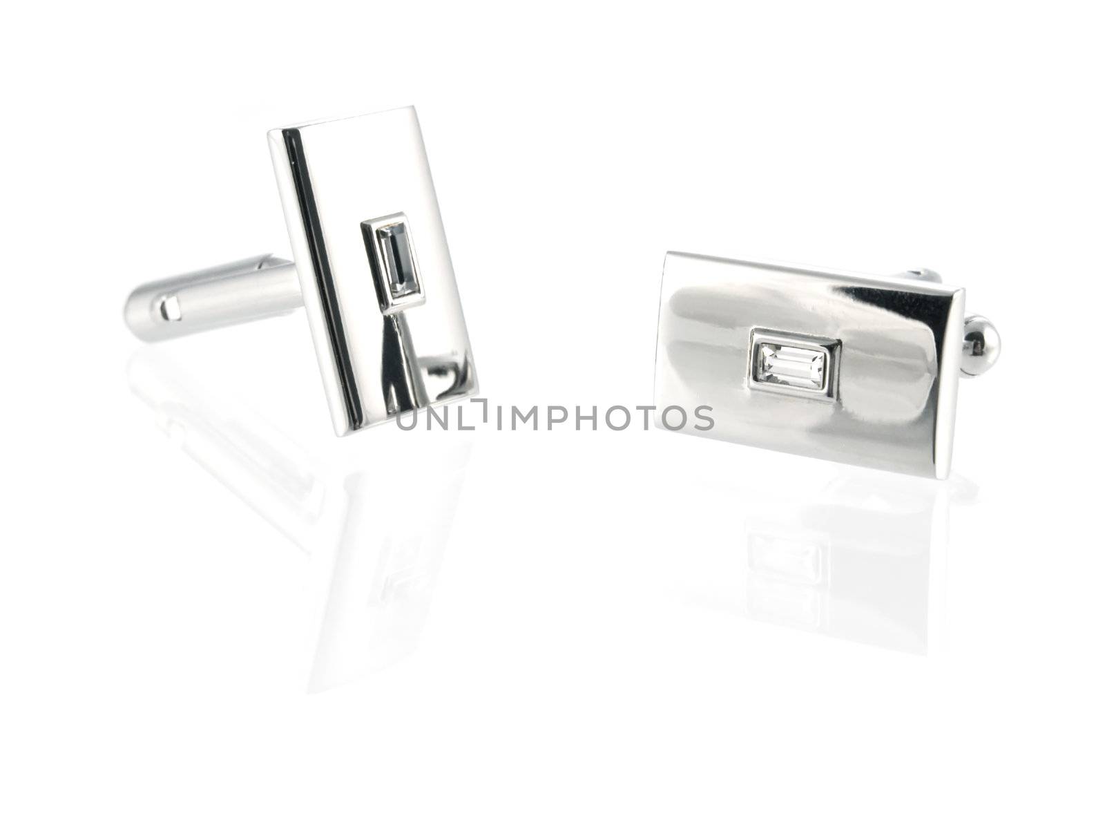 silver cuff link isolated on white background