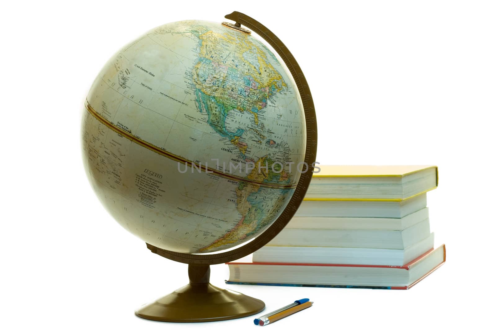 Assorted school supplies for a college student, including a globe, some text books and a pen