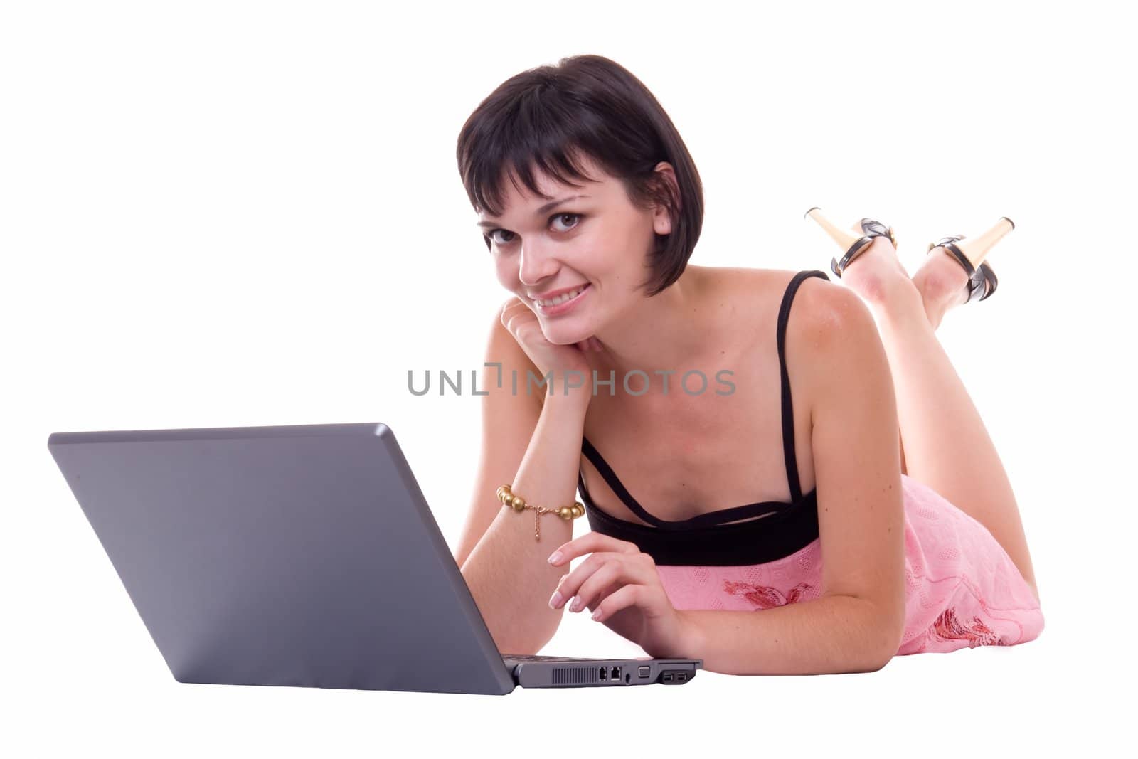 charming student with laptop on a white background
