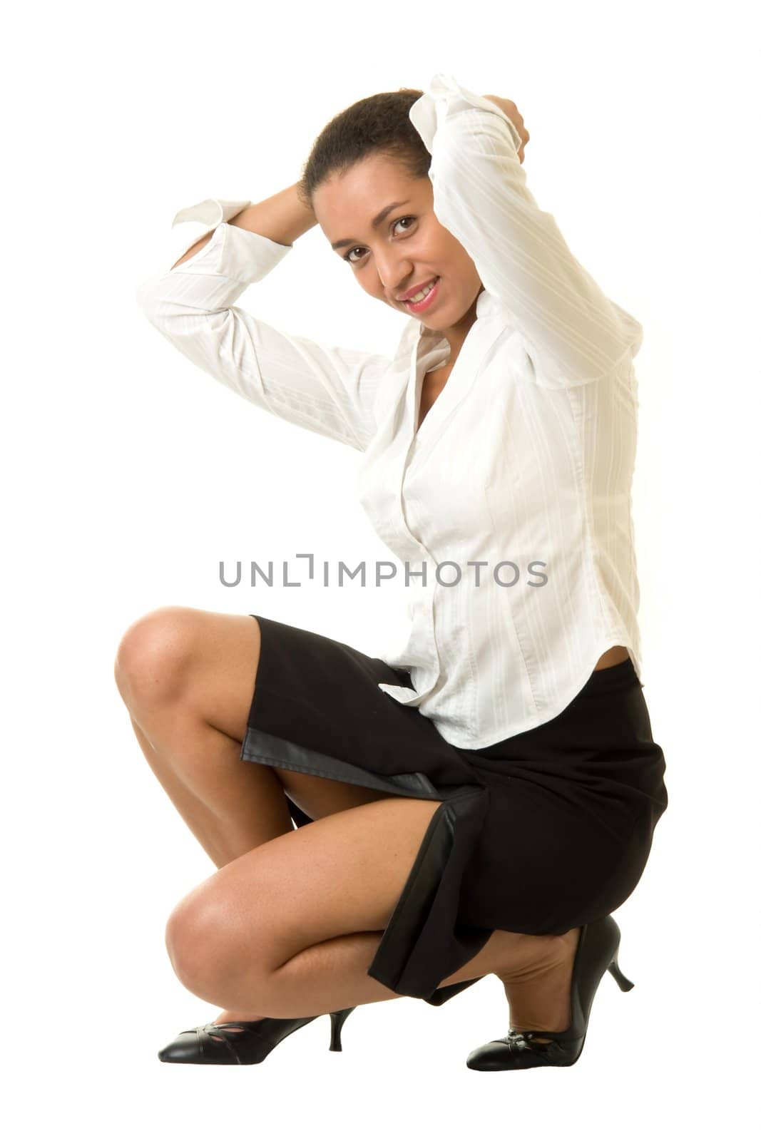 beautiful woman sits on a white background