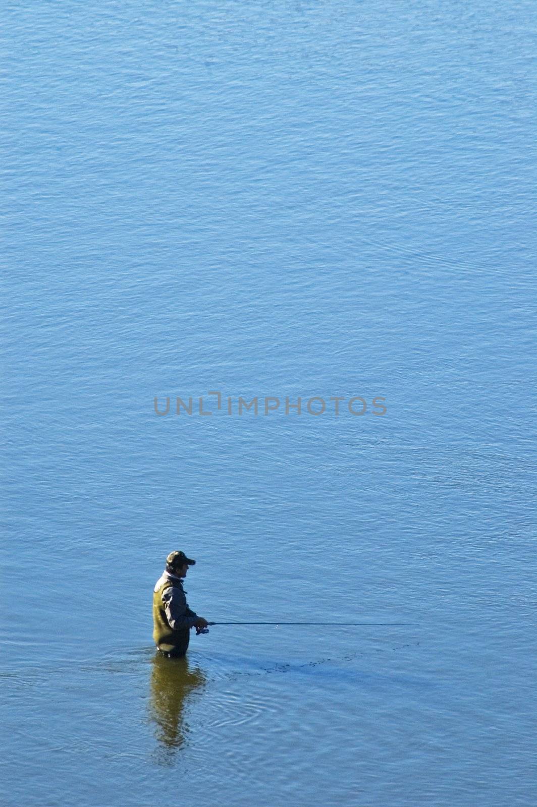 Fisherman go fishing in Vistula River.