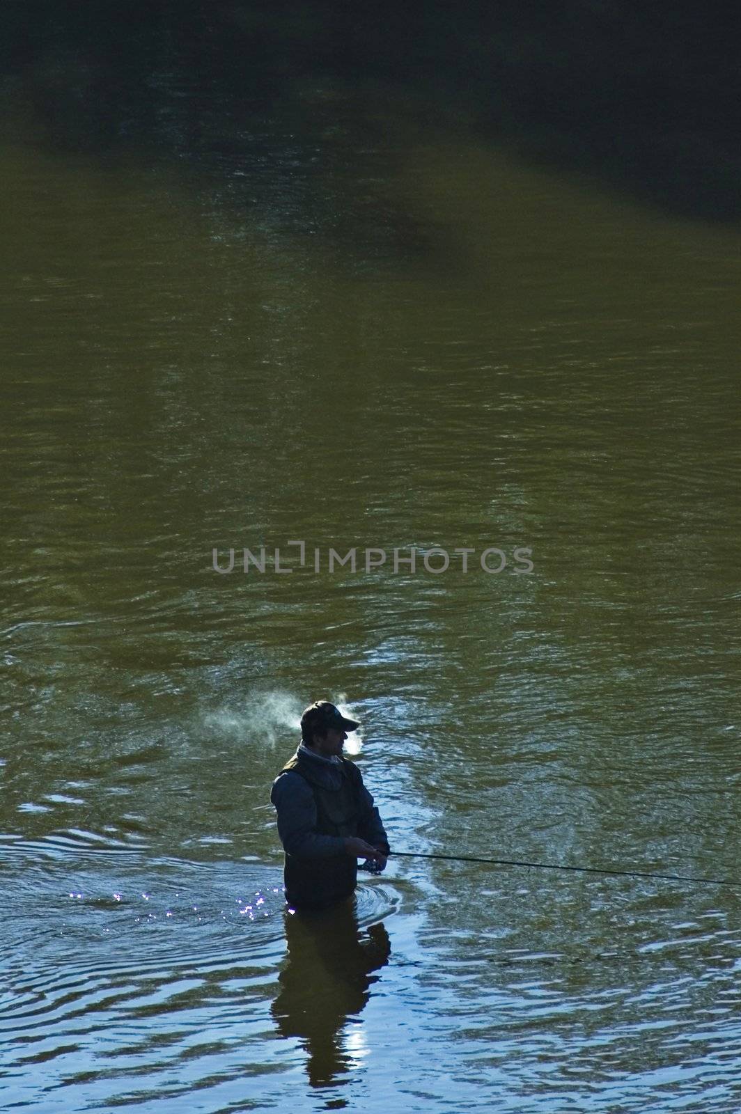 Fisherman go fishing and smoke cigarette.