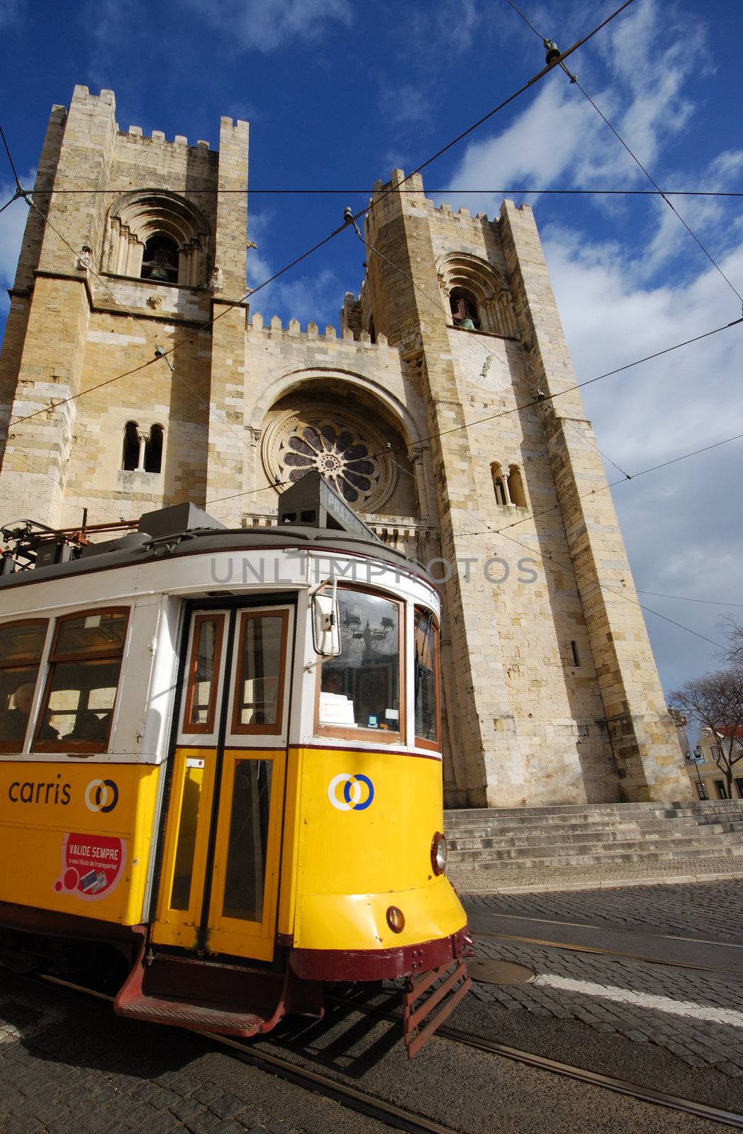 cathedral S� de Lisboa and a crossing tram 