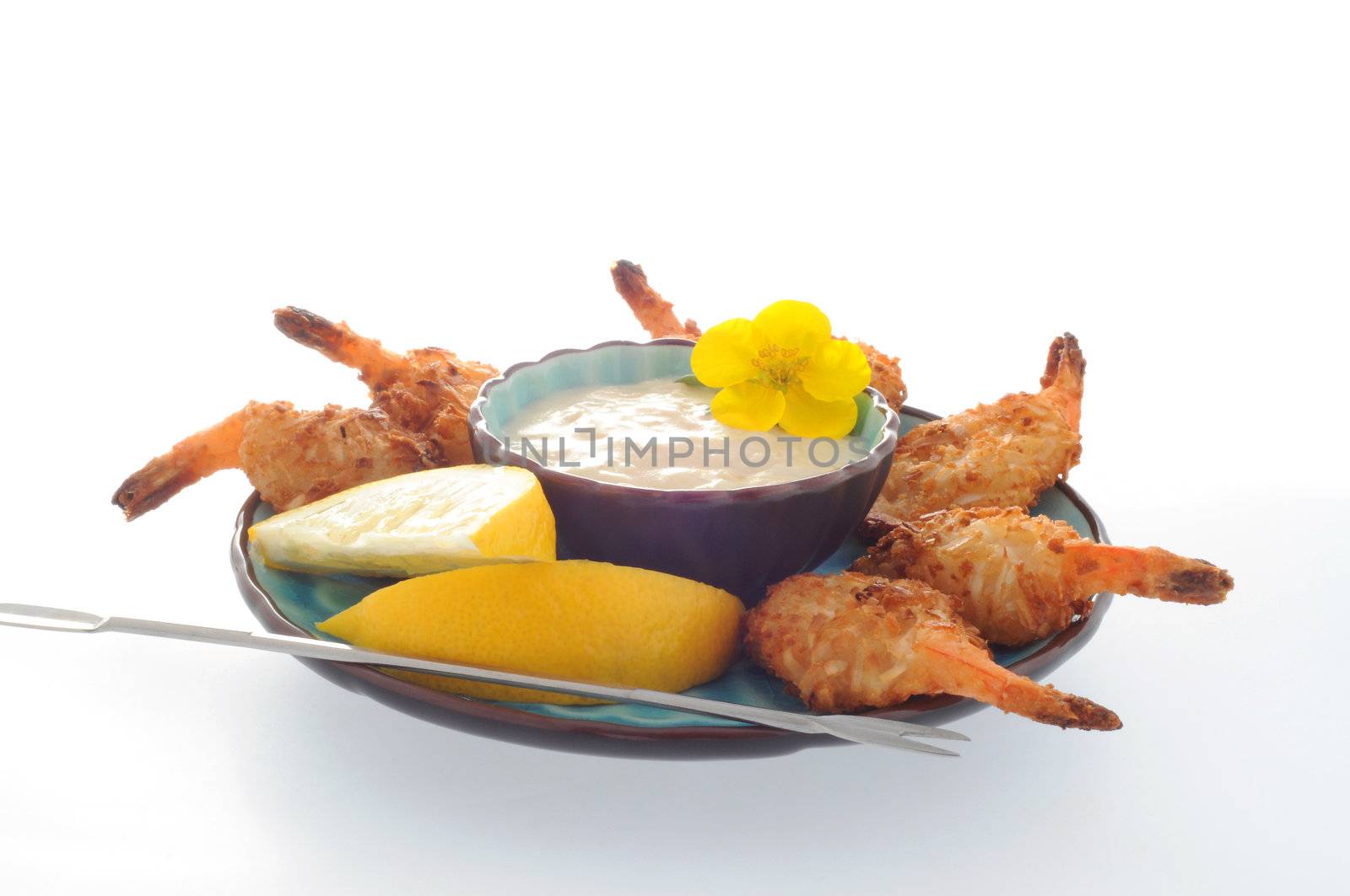 Coconut shrimp served with a dipping sauce.