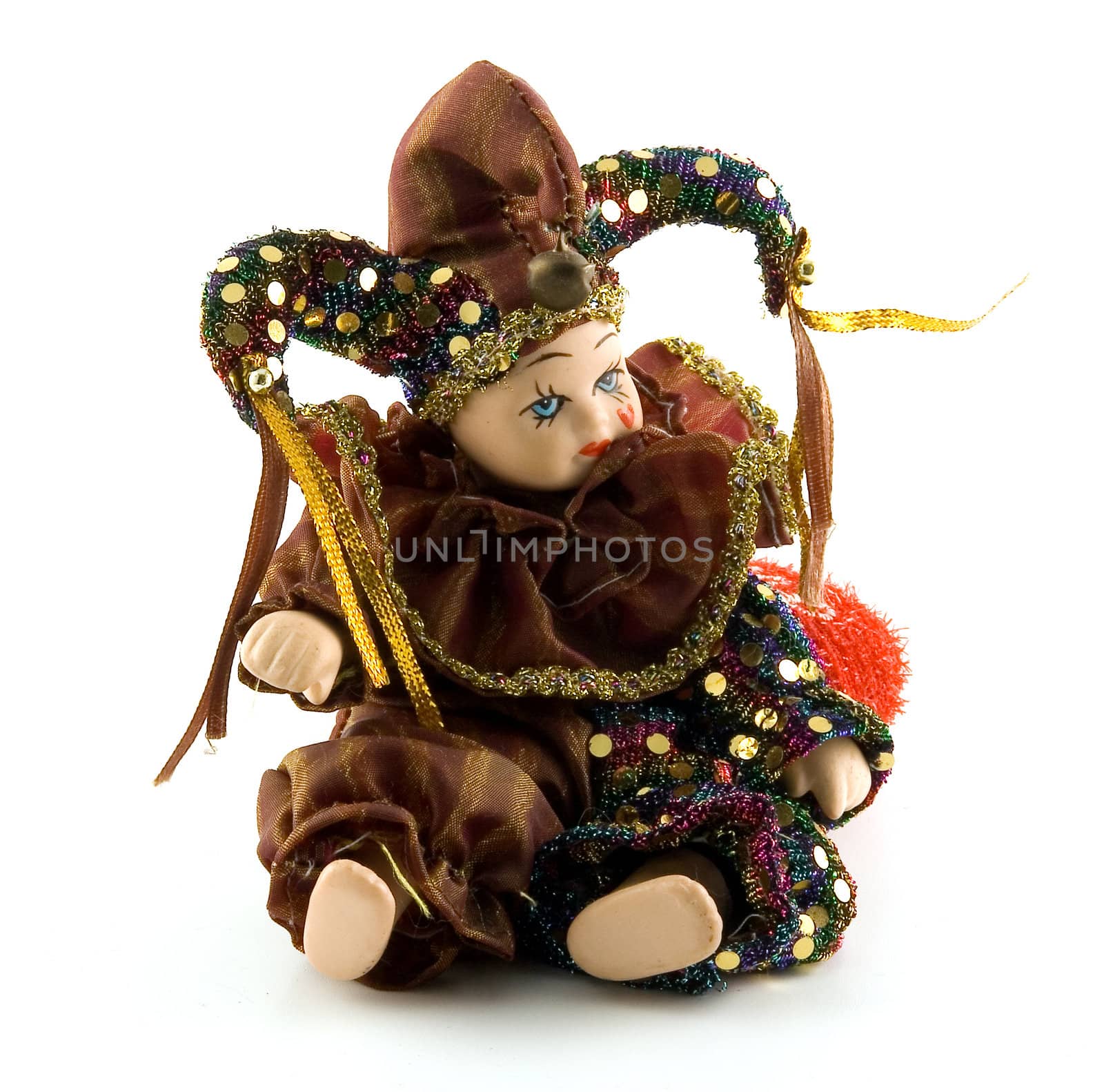 The Venetian doll in traditional carnival costume  Arlecino on a white background. Isolated object.