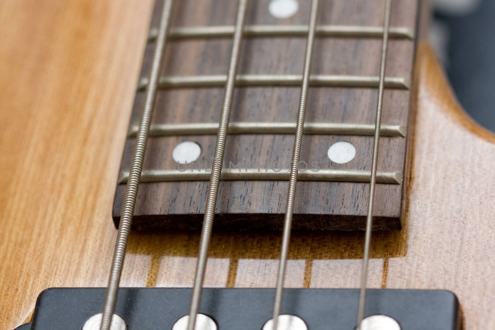 four strings bass guitar closeup 