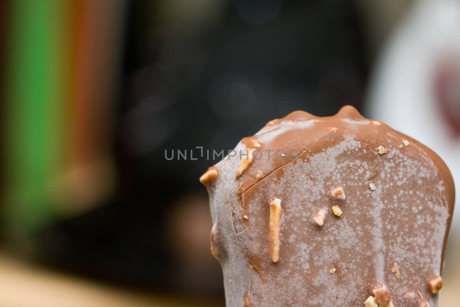 ice cream with nuts on abstract gray background