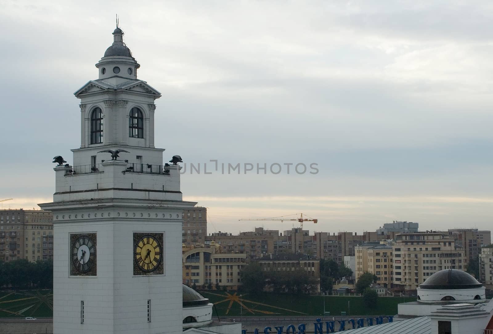 Sunrise in Moscow, view of clock tower of the Kievskiy depot and Berezhkovskaya embankment