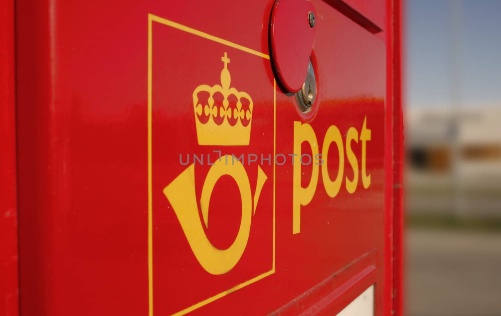 The classical red norwegian letter box, used by Posten Norge for collecting letters and postcards.