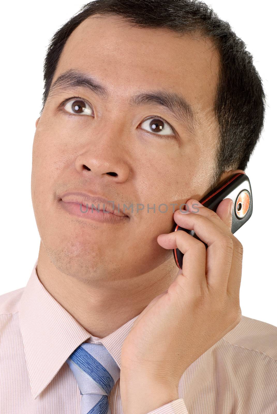 Businessman use cellphone and listening on white background.