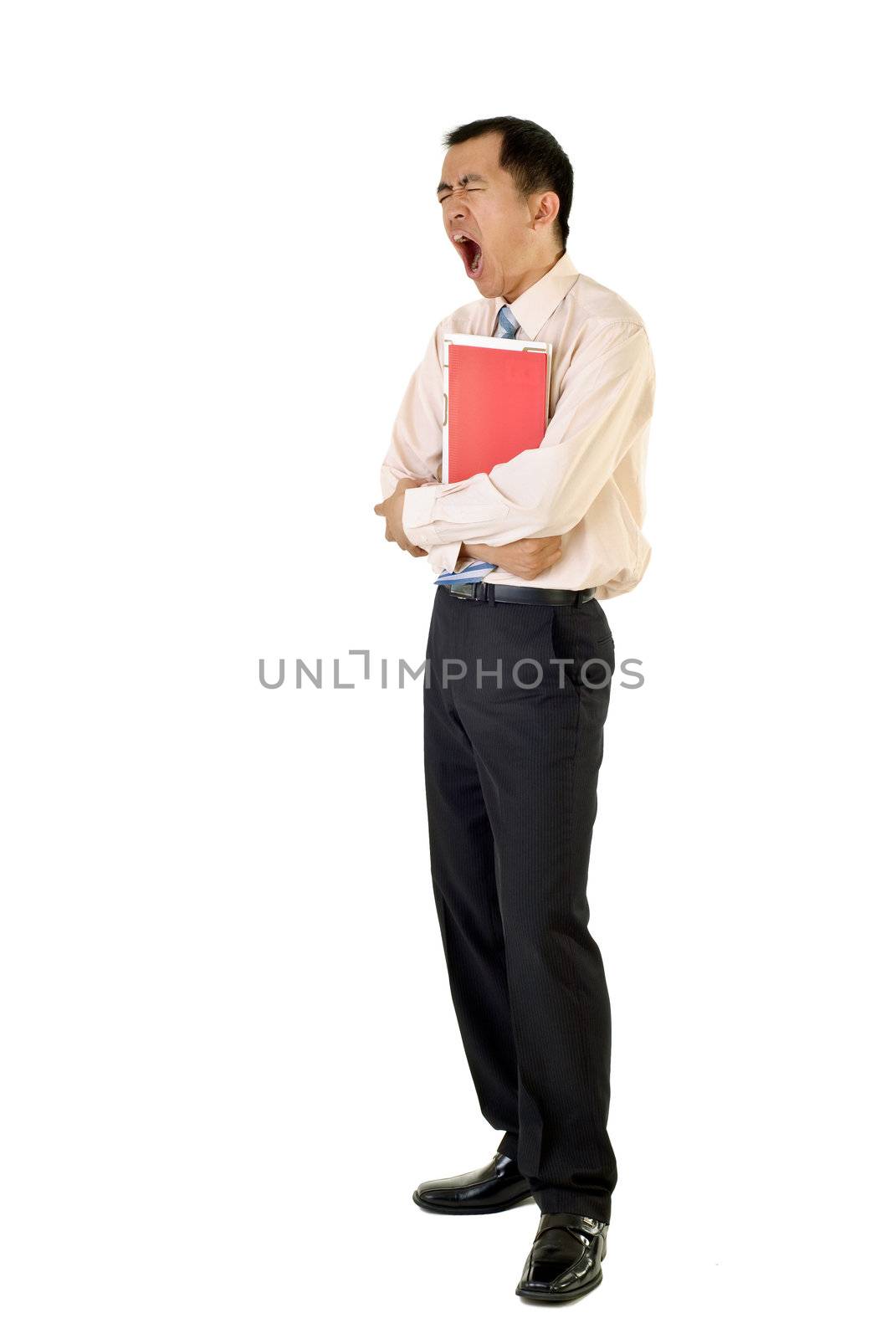 Tired businessman holding folders yawning on white background.