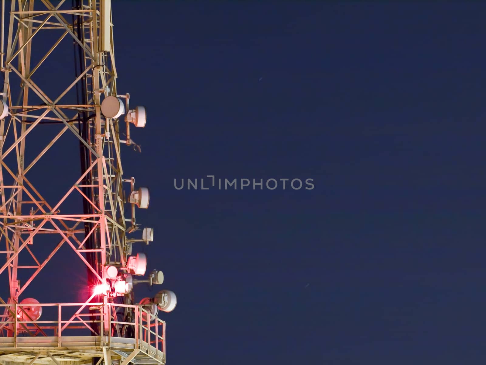 Detail of mobile phone service antenna at night