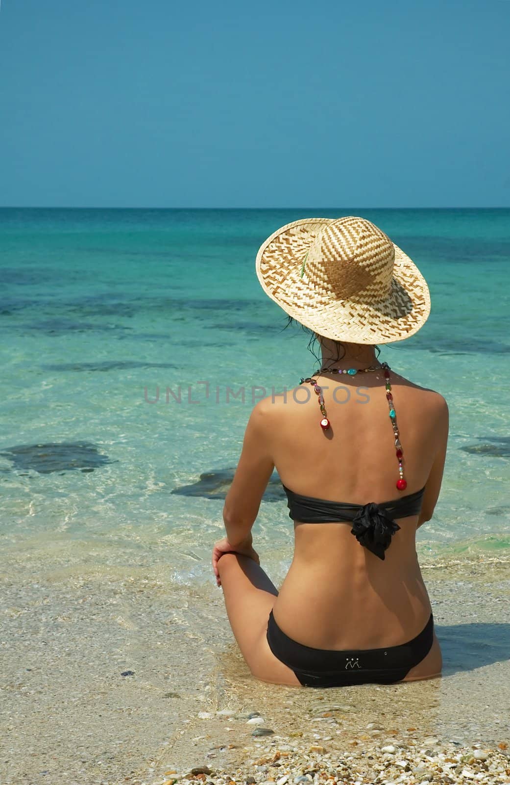 Beautiful women  on the beach by kefiiir