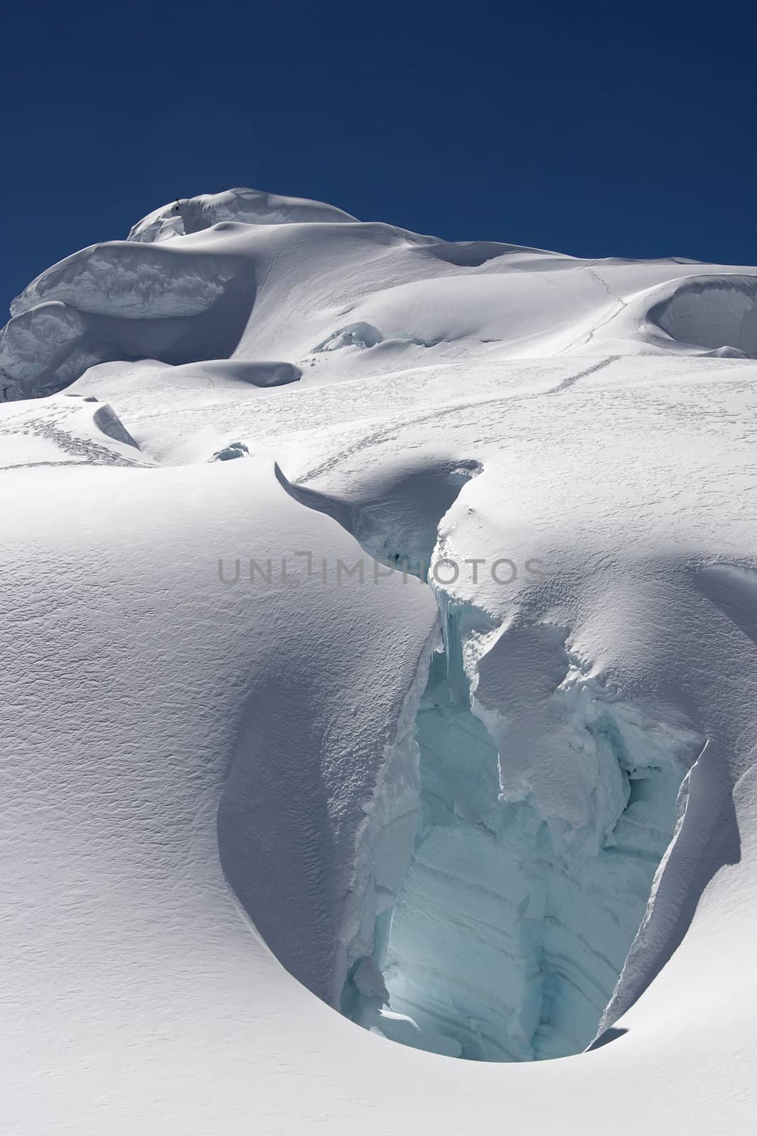 Huge crevasse on classic route to Pisco summit (in the background), Cordillera Blanca, Peru