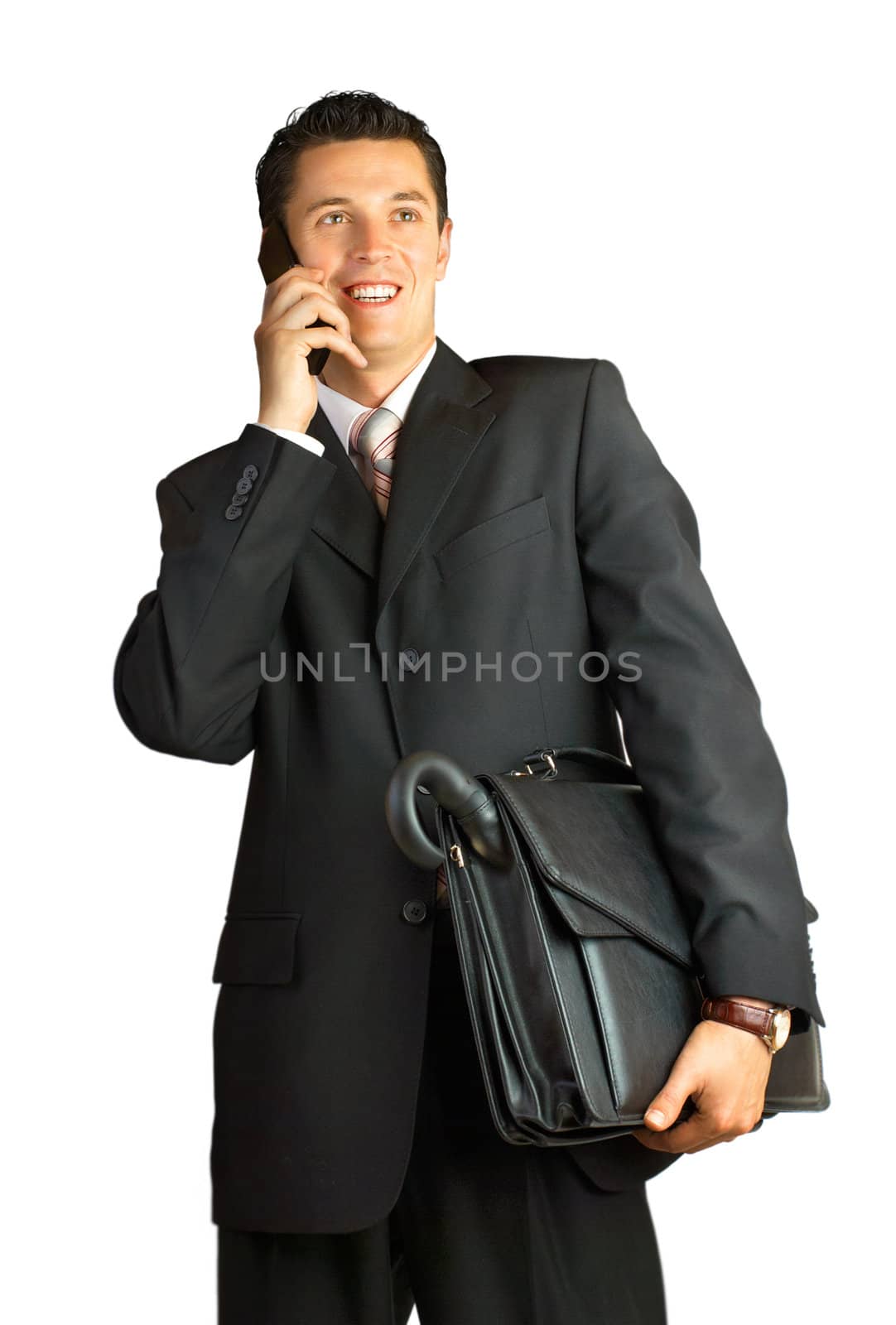 Businessman with cellphone and briefcase. Isolated on white.
