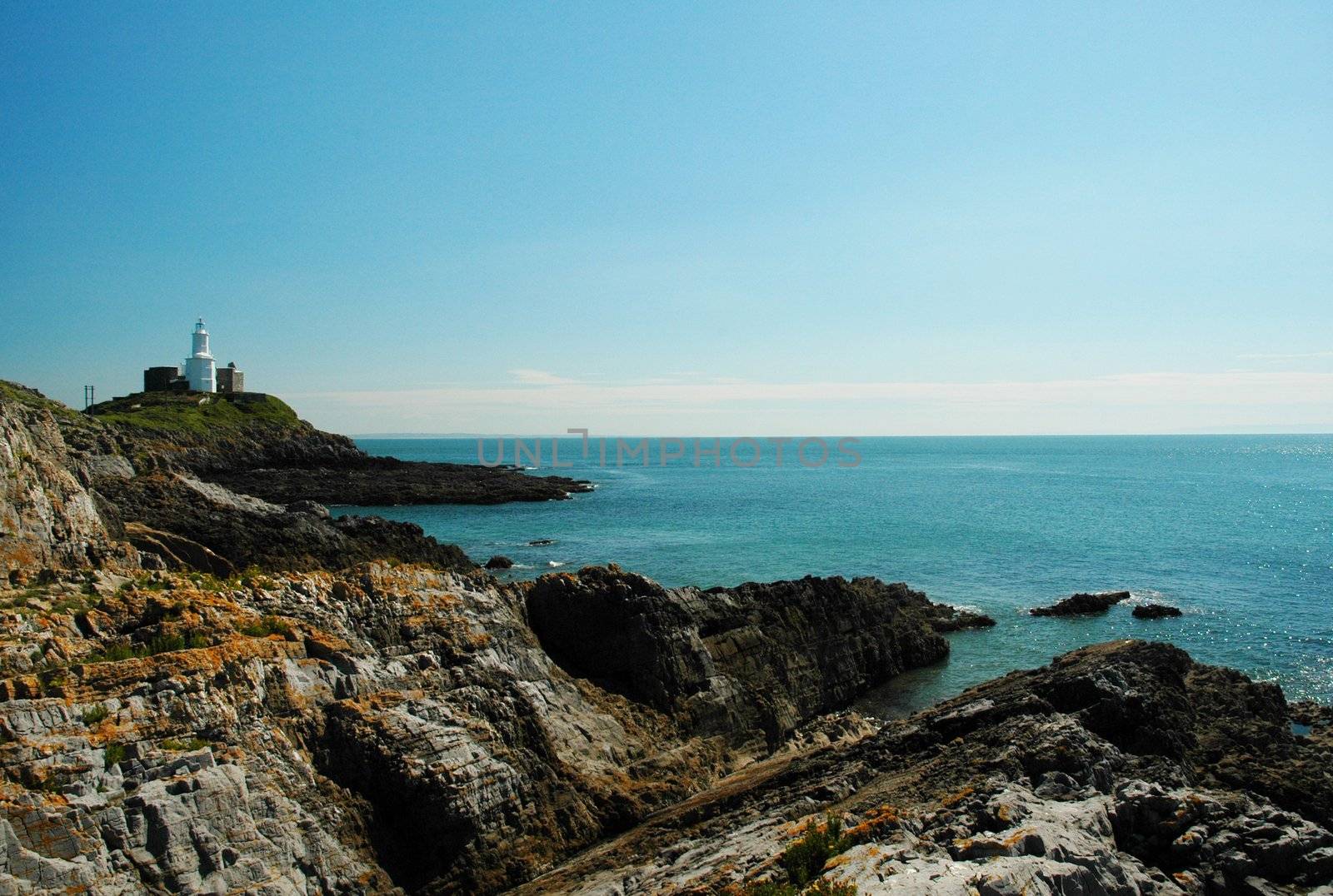 coast of Swansea in Wales with blue sky