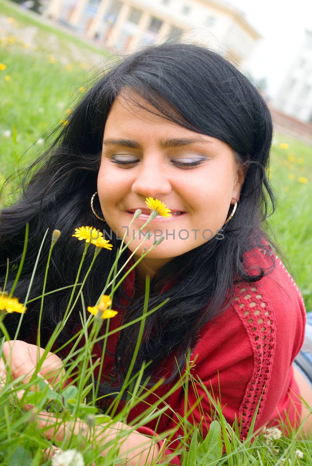 lovely female model.beautiful girl lying down of grass.