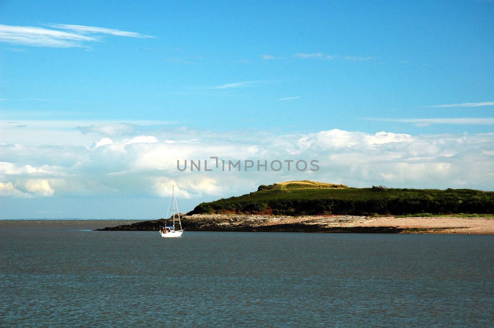 sully island and sea,  horizontally framed picture with boat