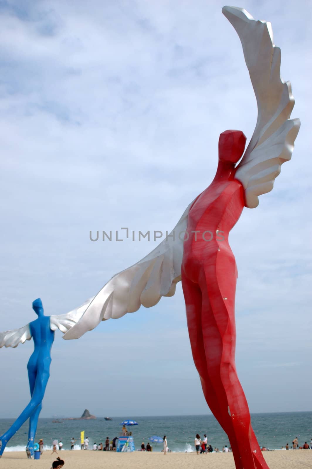 South China Sea, beach at DaMeiSha near Shenzhen city in Guangdong province. Place decorated by big angels sculptures.