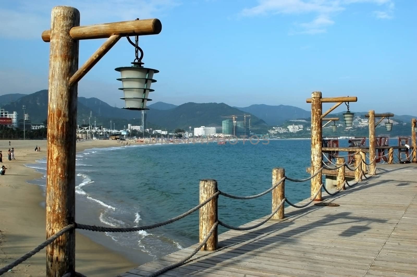 South China Sea, wooden pier at beach near Shenzhen city in Guangdong province.
