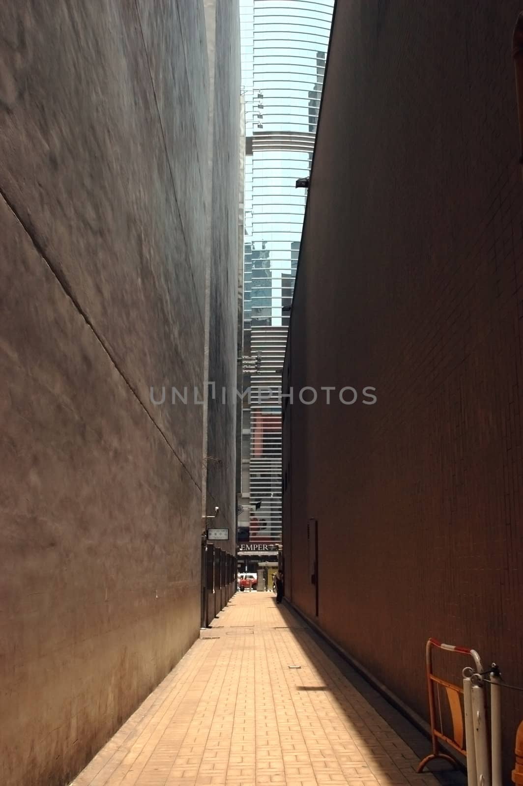 Tight passage between two buildings, two walls close to each other in Hongkong, Kowloon. 