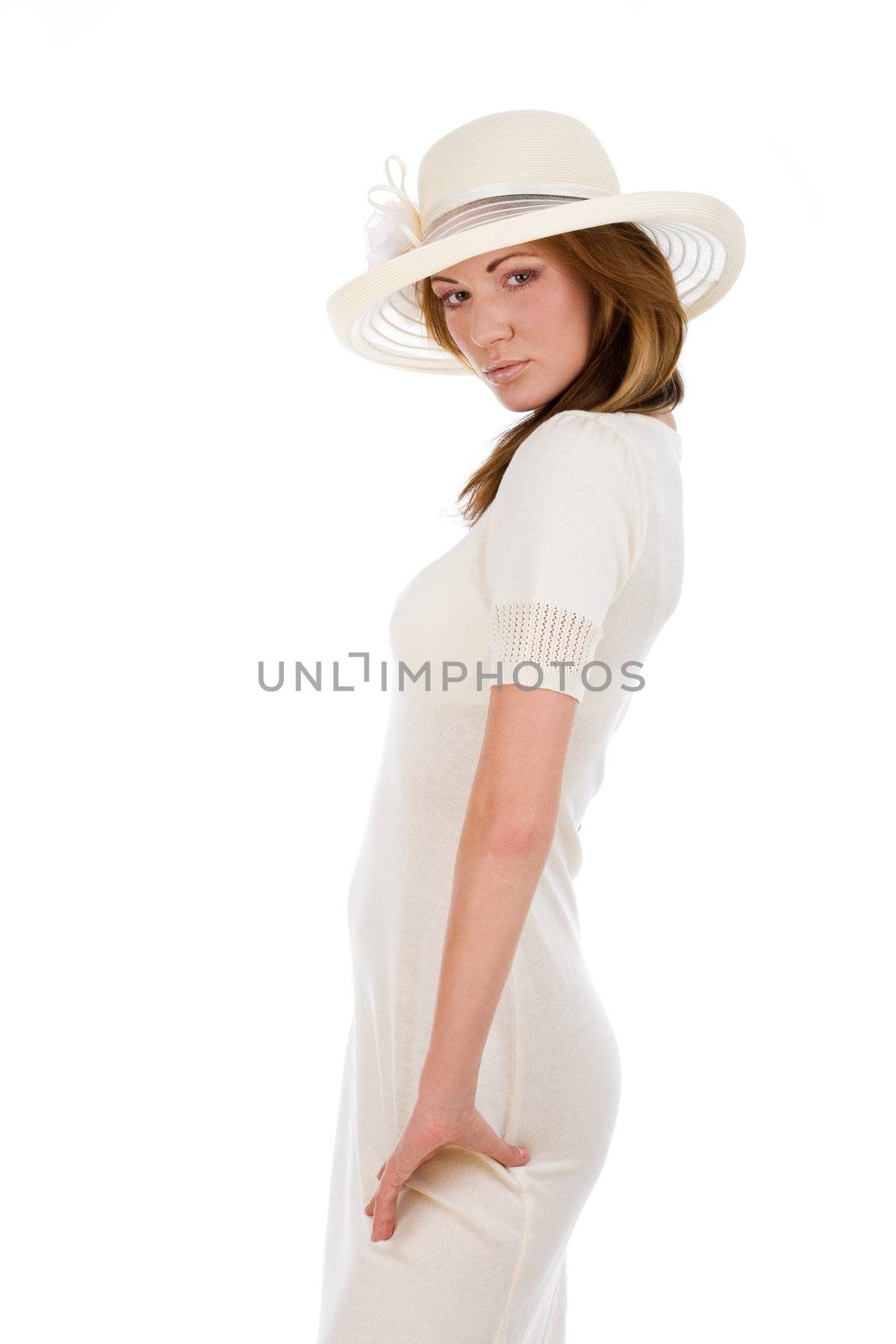 Young pretty woman in a white hat by mihhailov