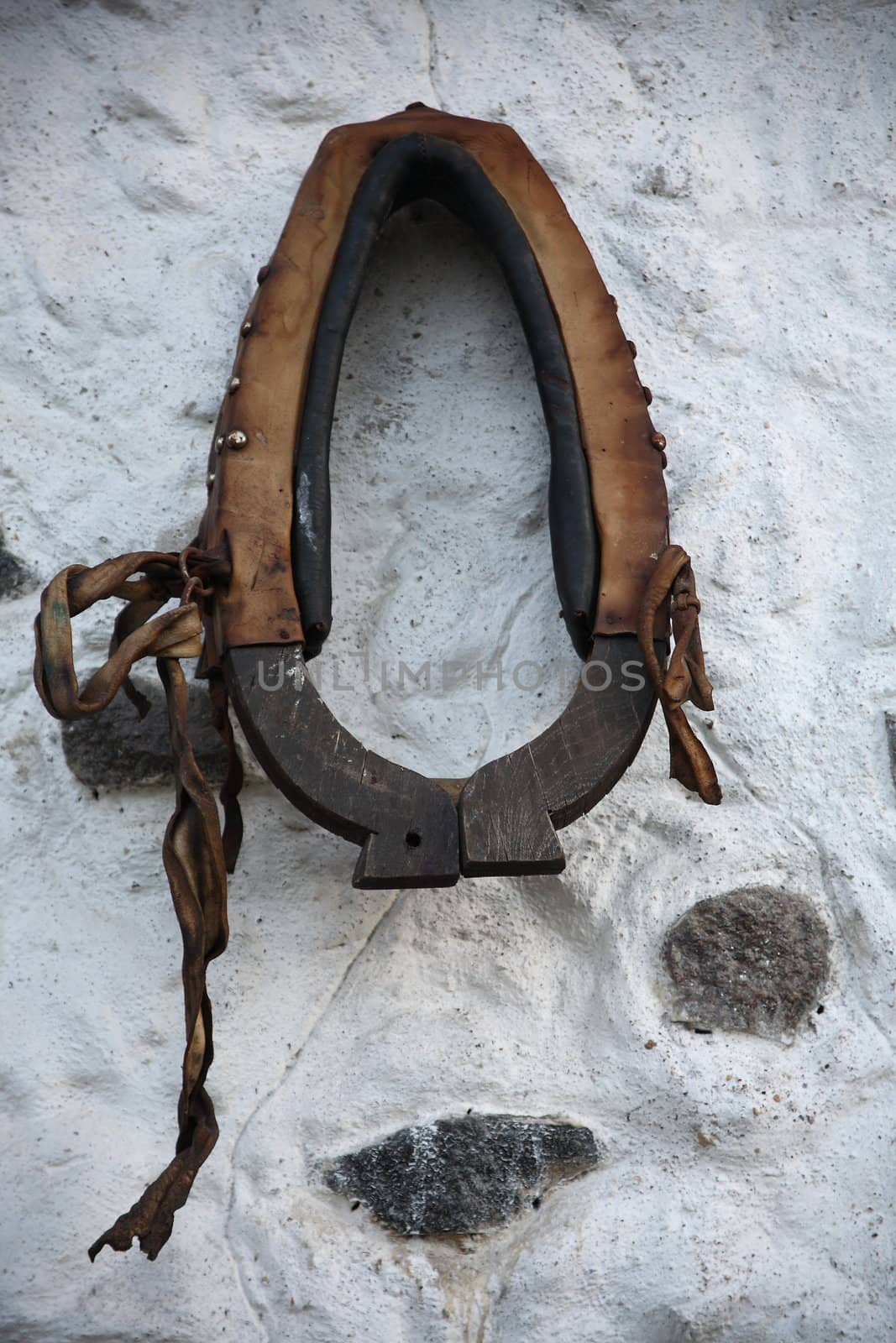 The horse's collar, hinging on wall, interior,  old-time Russia