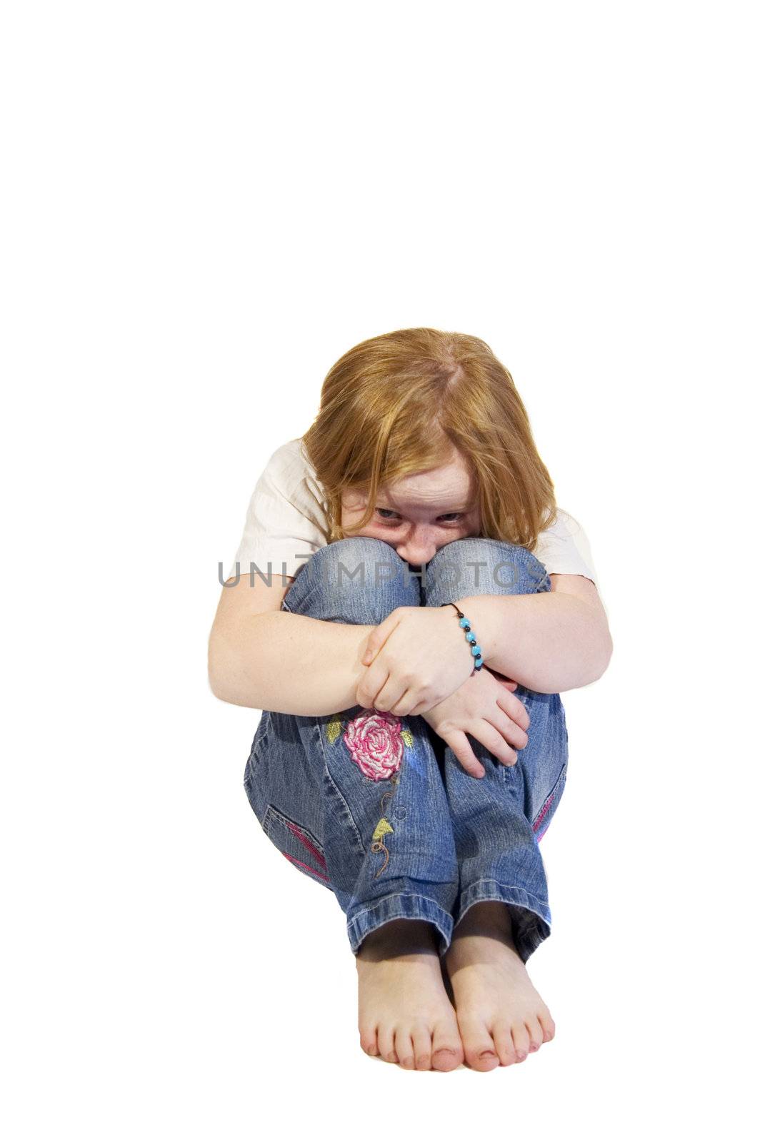 scared little girl isolated on a white background