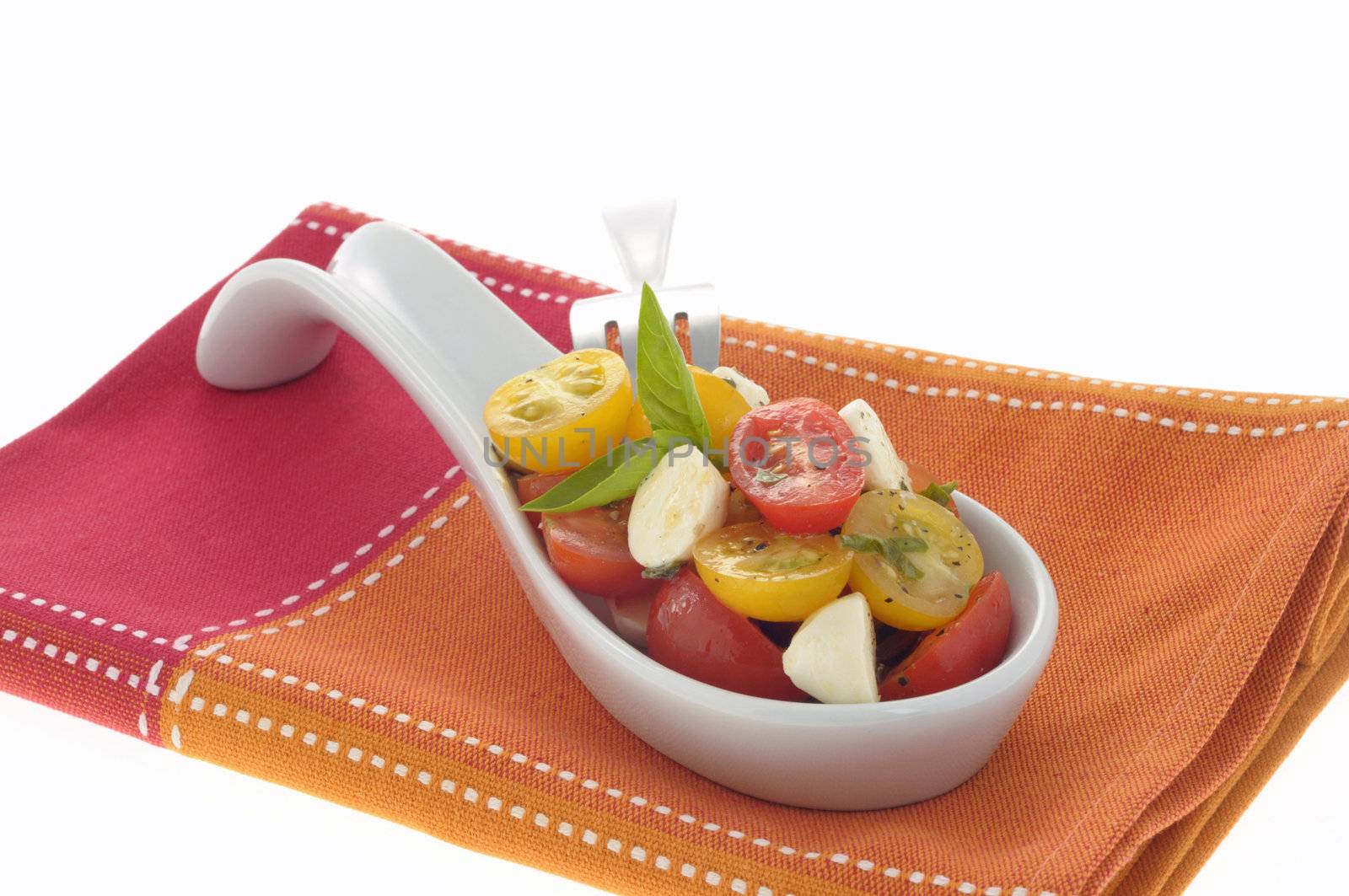 Salad of heirloom tomatoes and fresh mozzarella.