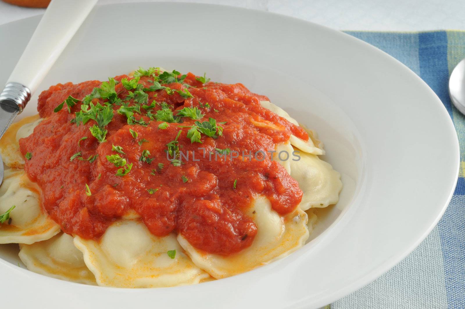 Delicious homemade ravioli pasta with marinara sauce'