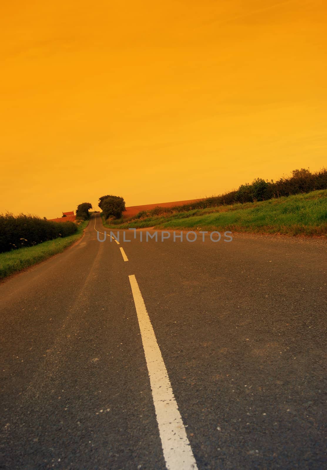 Empty country road with road marking (overlaid with yellow)