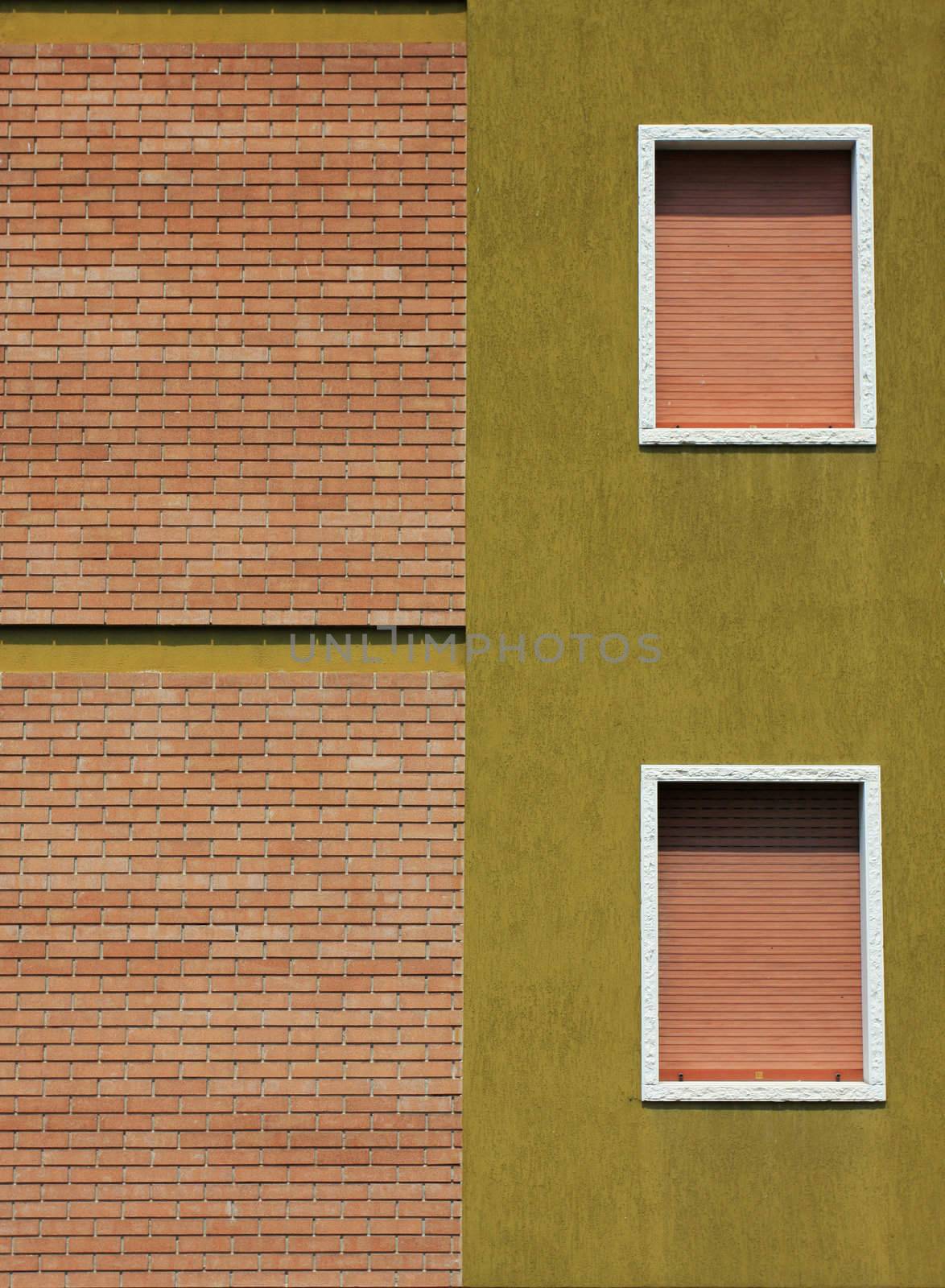 two windows on a housewall, great symmetry and harmony