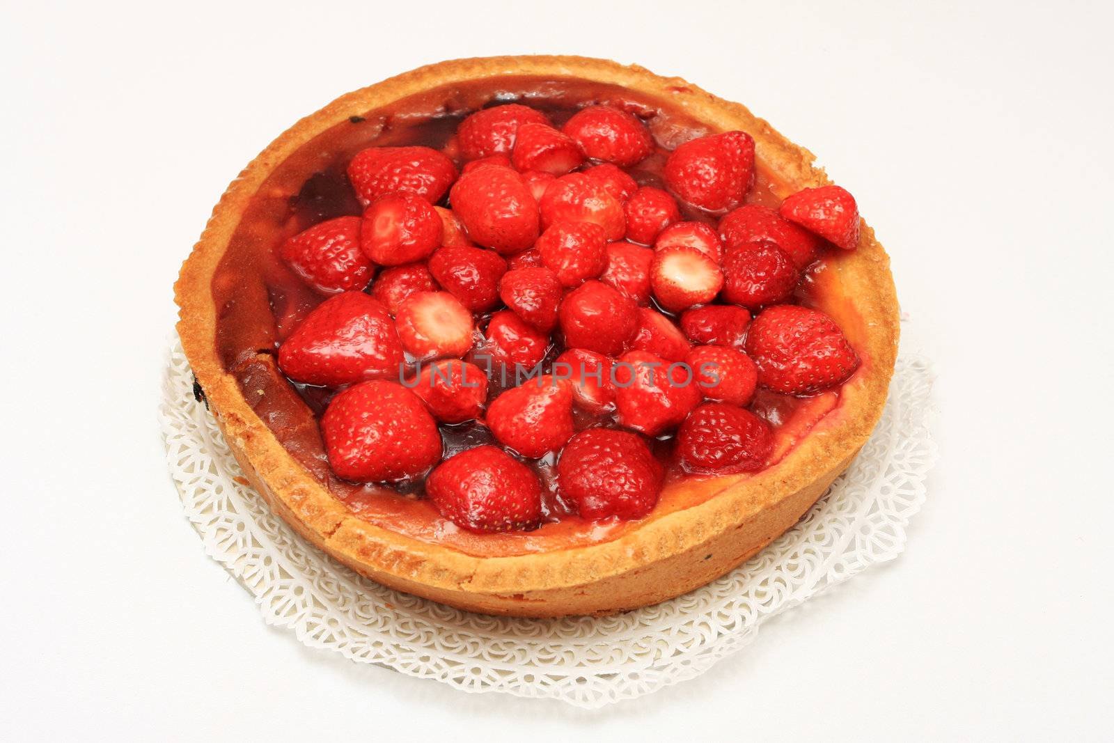 Fresh strawberry cake shot from above, isolated on white