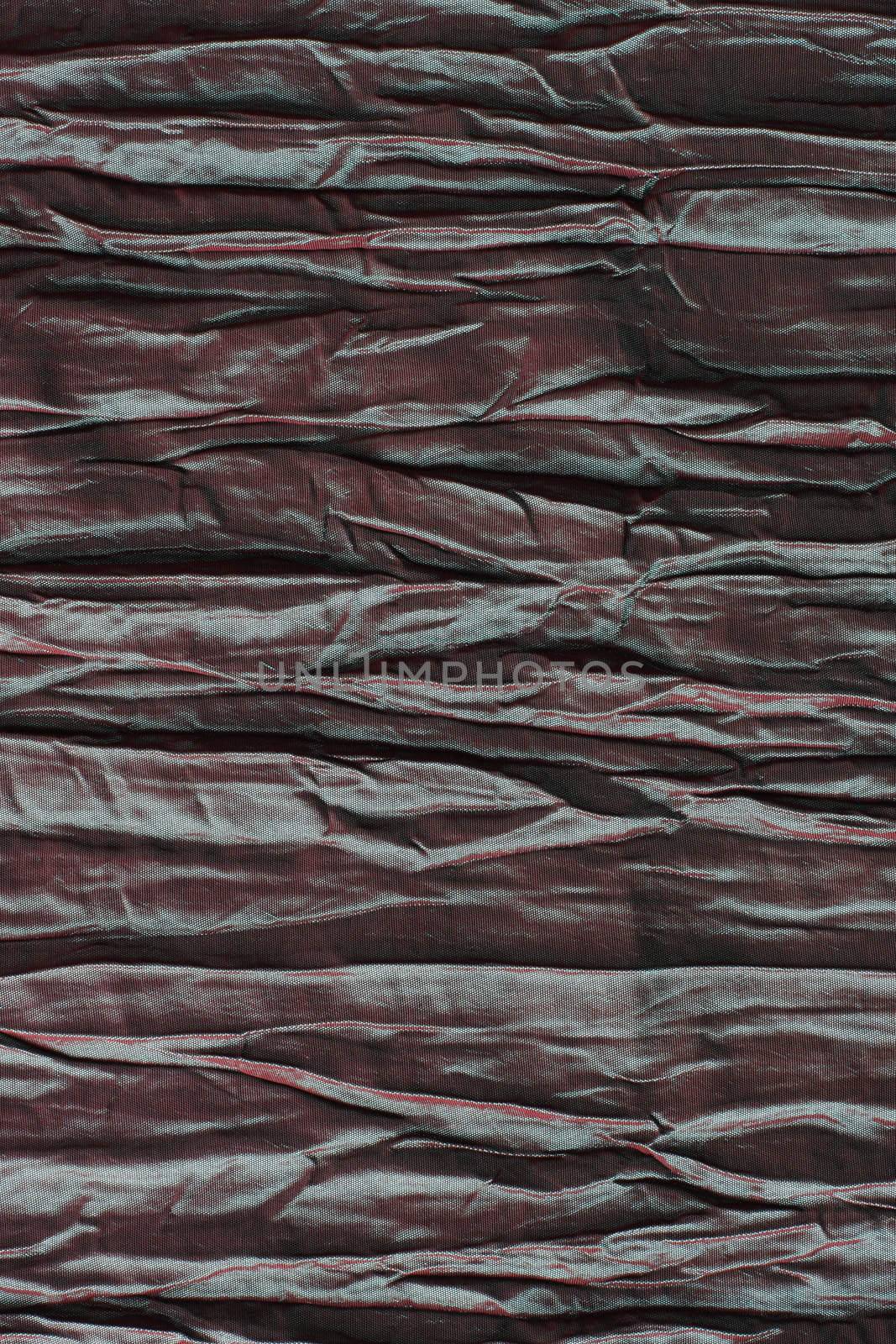 frame filling shot of threaded fabric, metalic look to it, Fabric is supposed to be wrinkly 