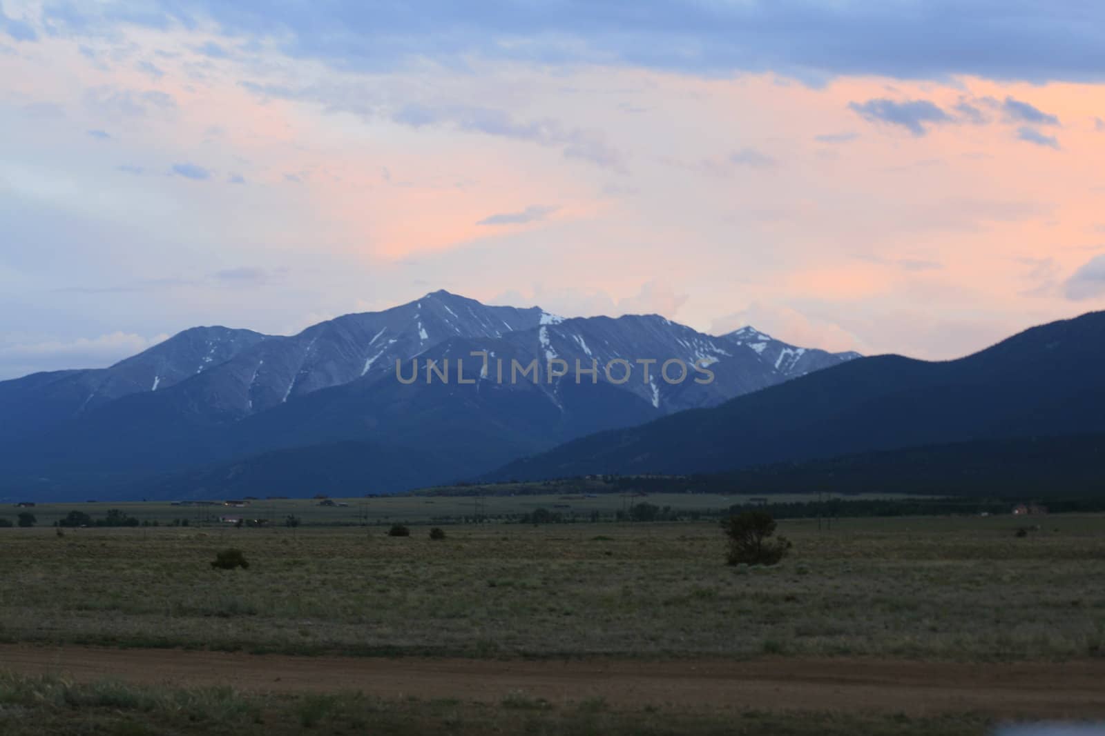 Colorado Mountains at sunrise, midday and sunset