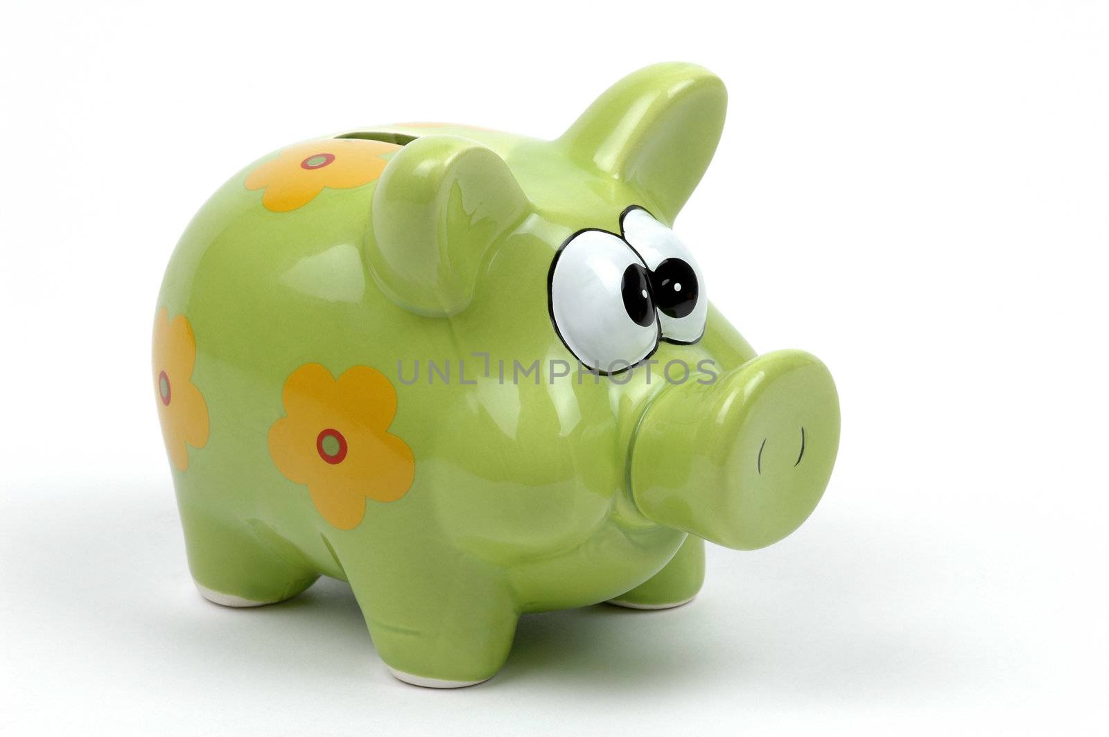 Brightly painted piggybank on a white background.