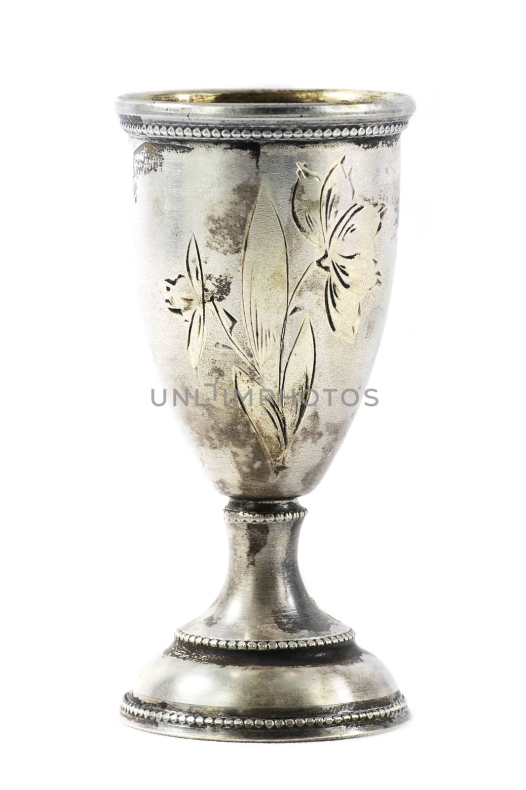 Old silver wine cup isolated over white