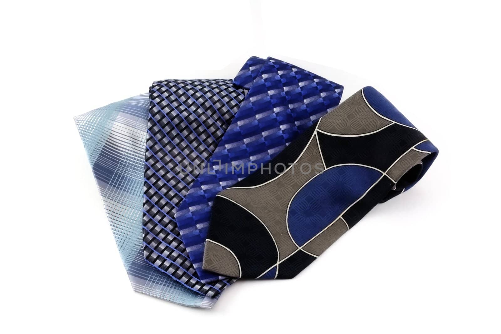 A group of four blue neck ties isolated on white.