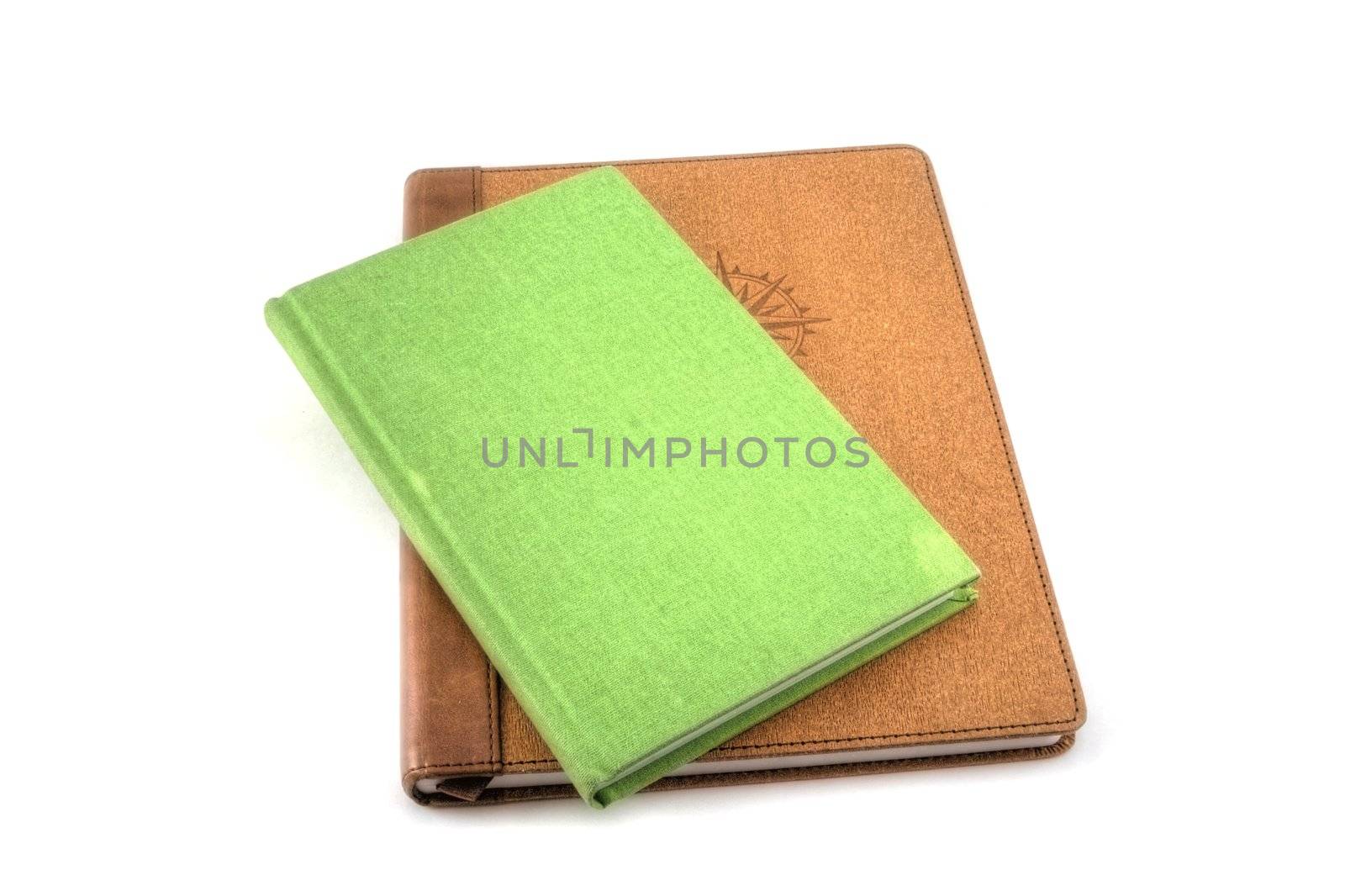 A green and brown travel journal isolated on white.