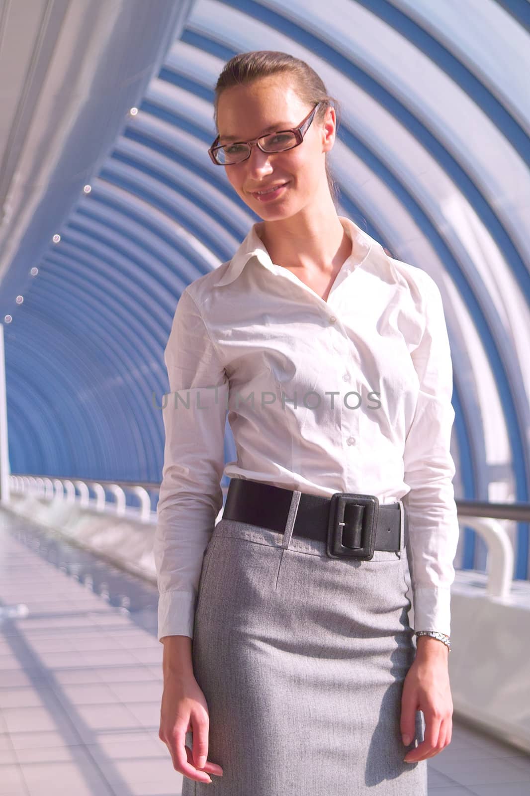 Portrait of beautiful young business woman in glasses