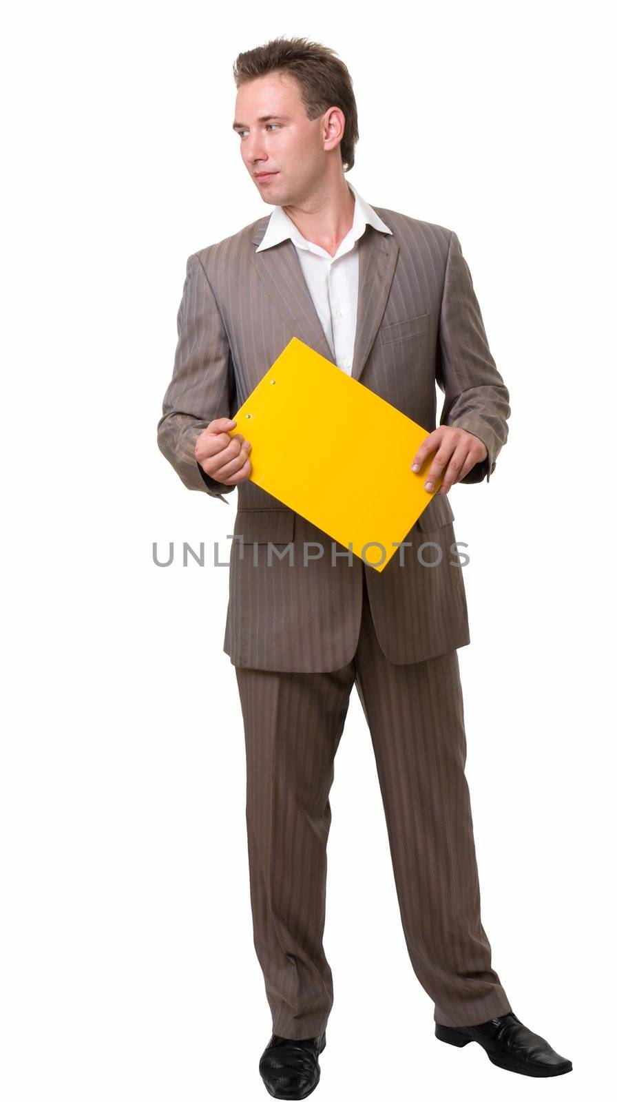 Young businessman with yellow folder on a white background.