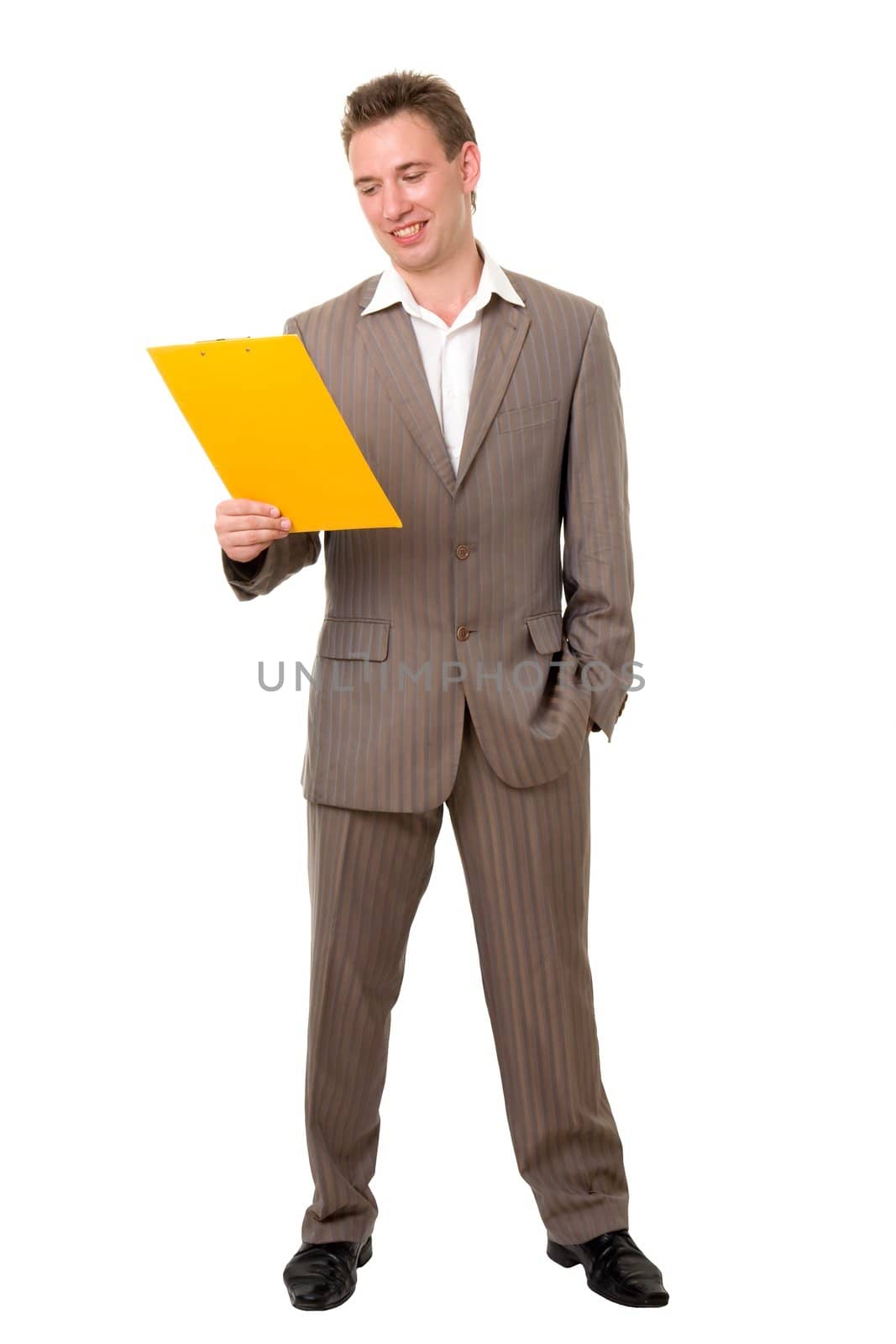 Young businessman with yellow folder on a white background.