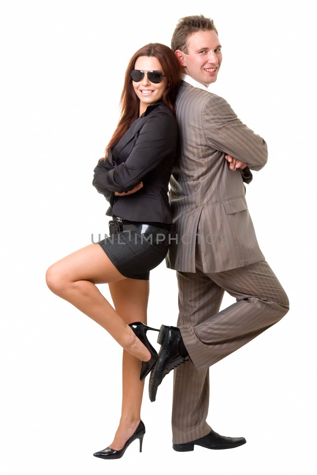 Loving couple stands on a white background