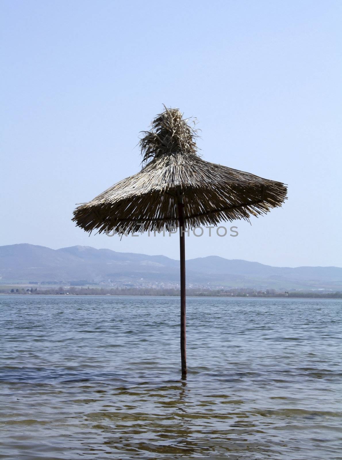 Umbrella in the water in Dojran Lake, Macedonia