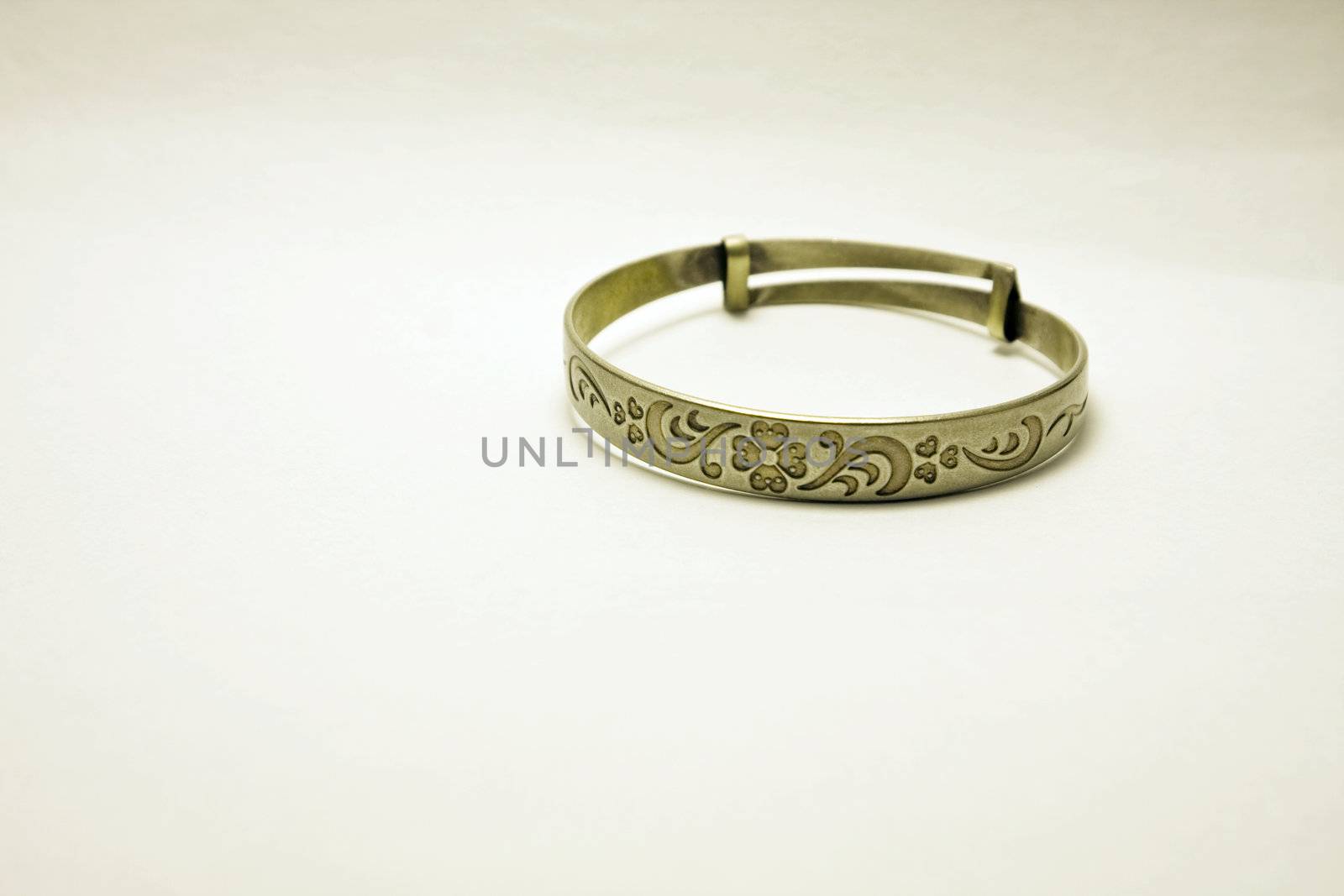 It is a iron bracelet on background.