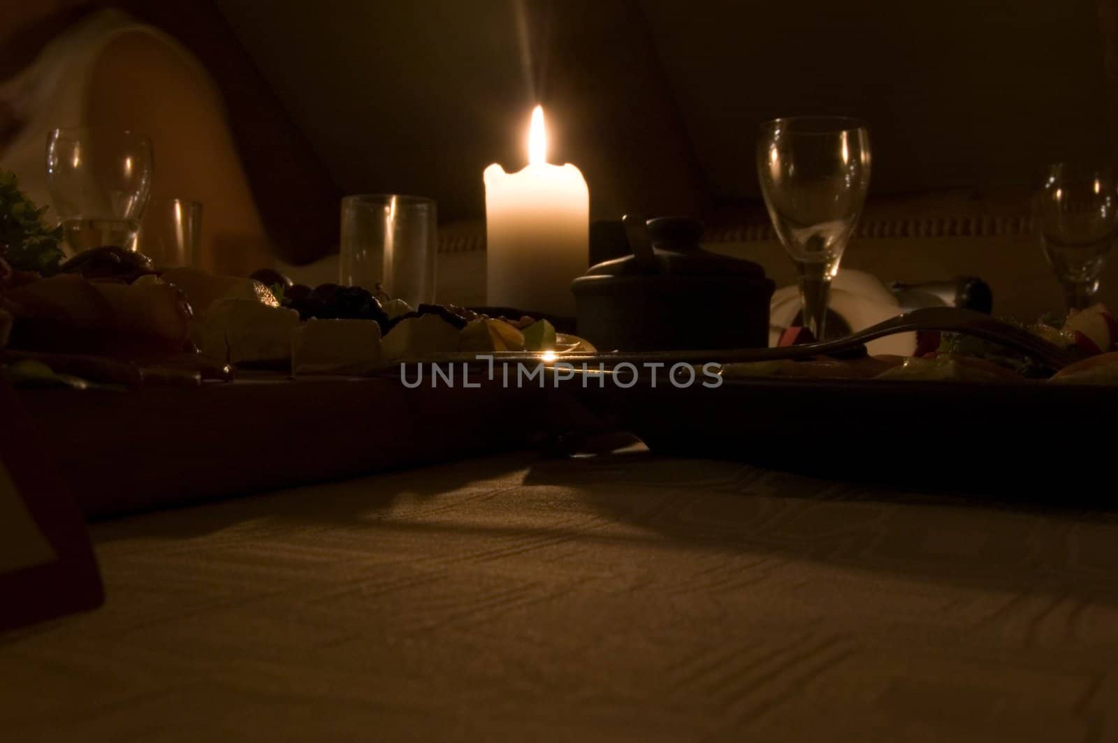 flame of candle on the table in restaurant