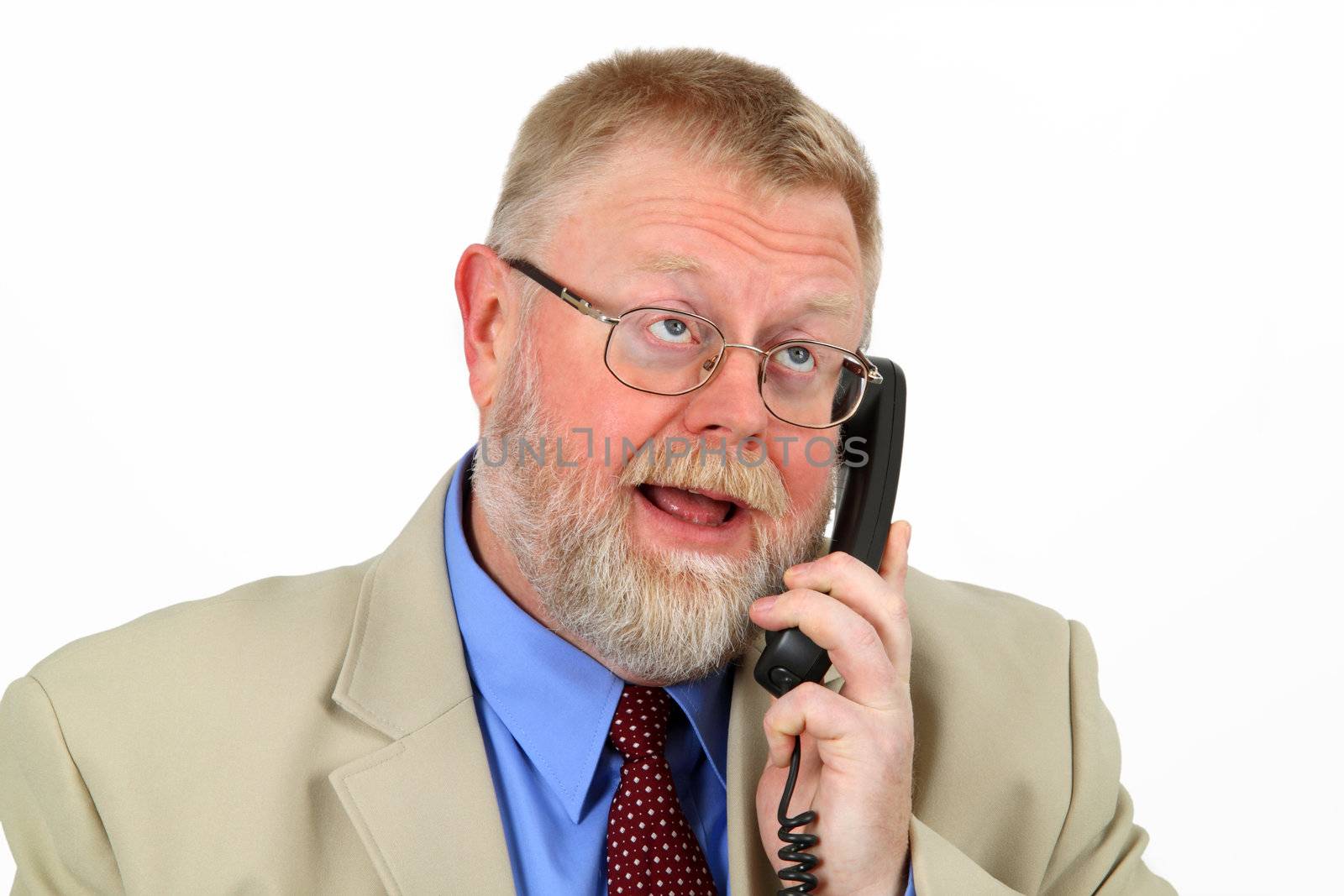 Businessman calling on aphone, white background.