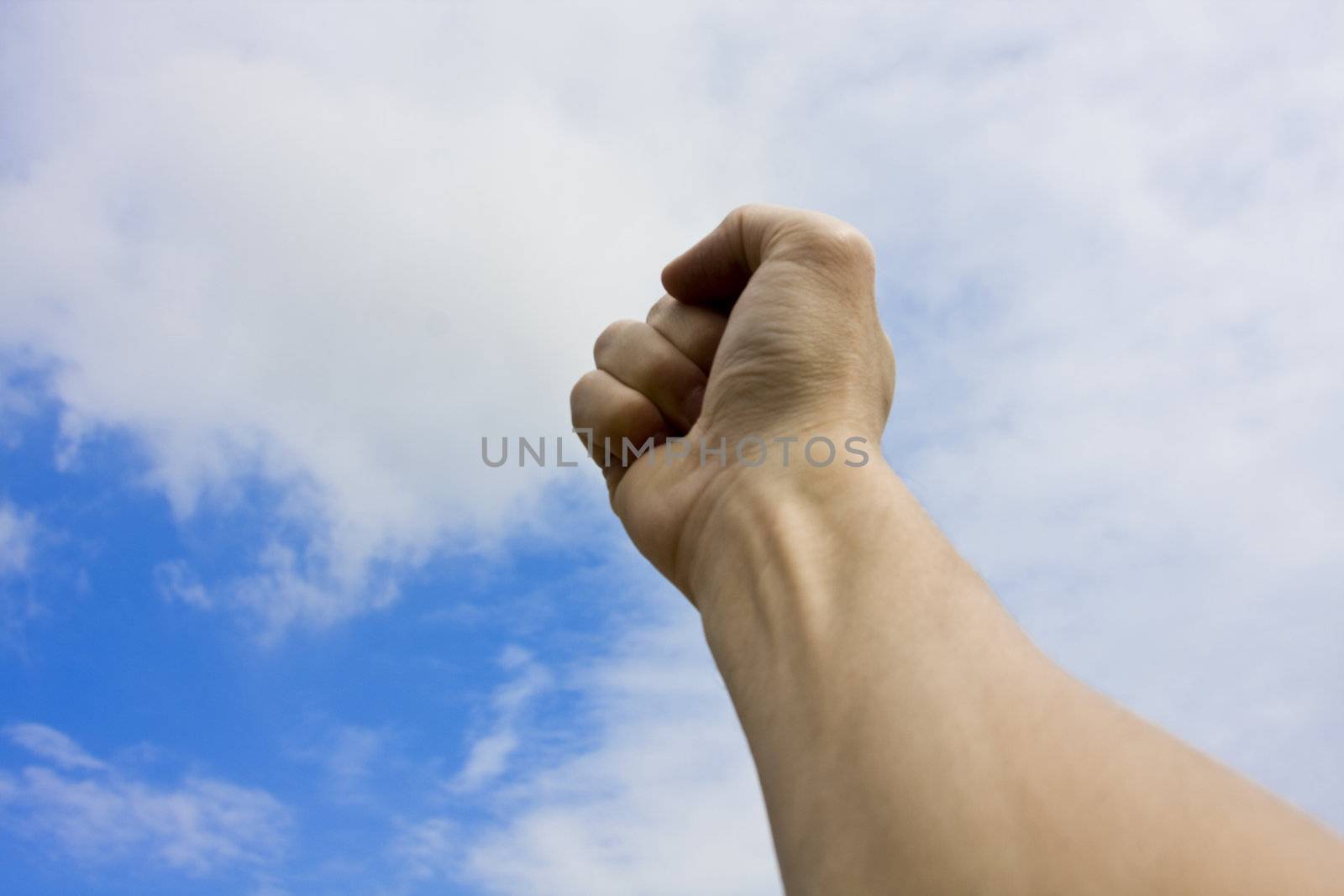 Hand with the Sky Background
to show challenge to a fight or contest.